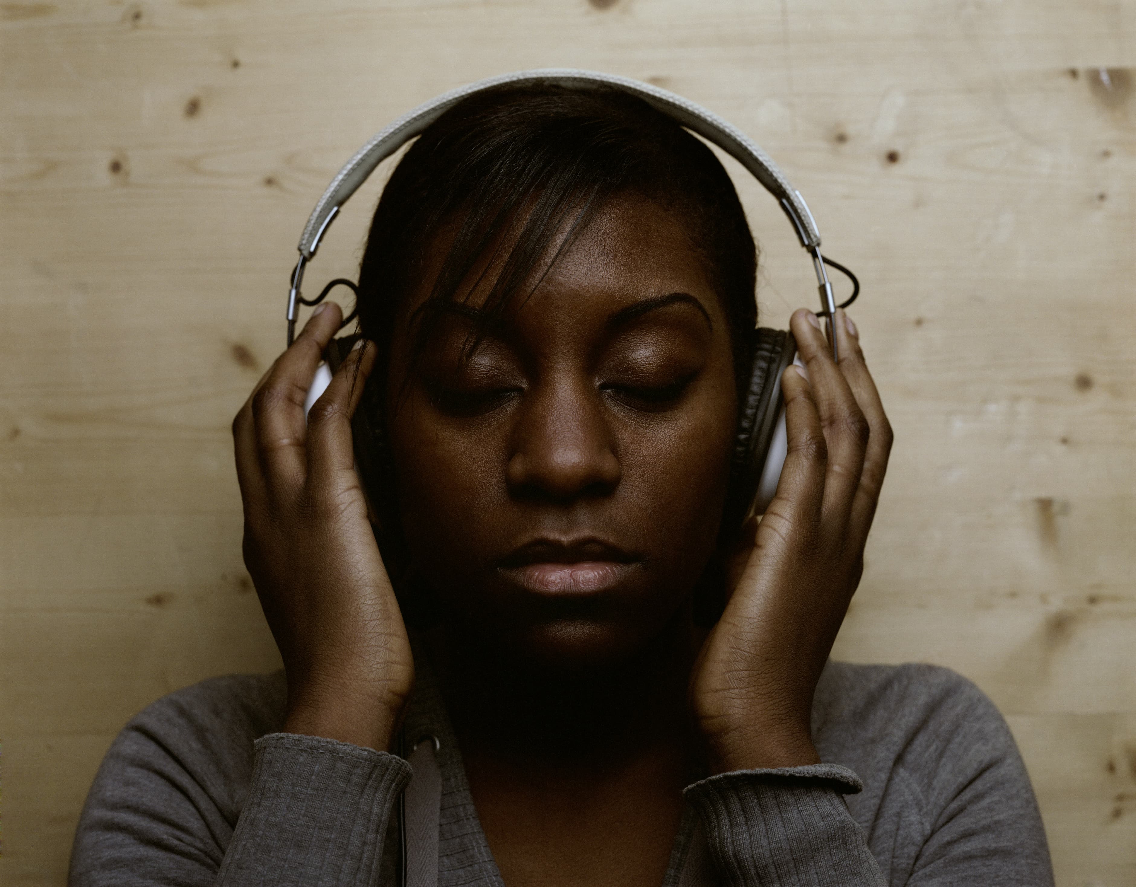 Woman listening to music on headphones